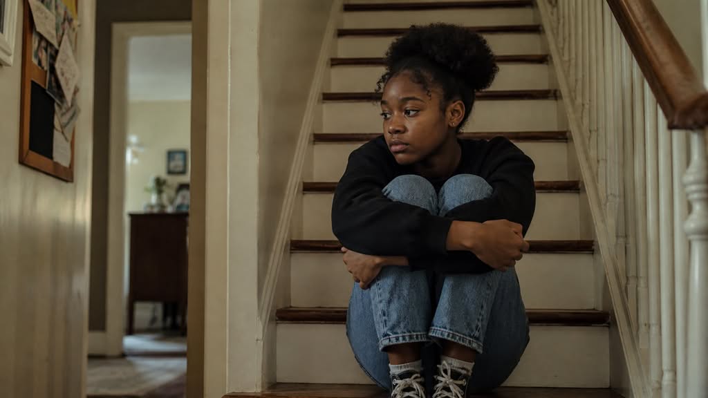 signs of teen anxiety teenage girl sitting alone New Lenox, IL